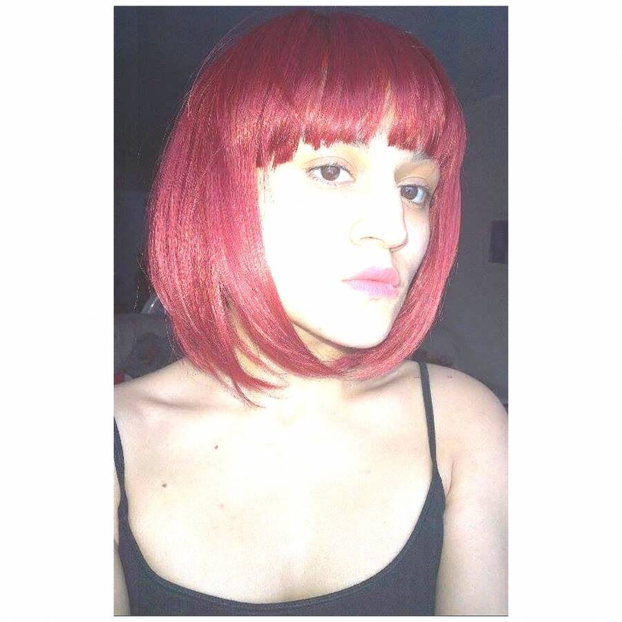 model Elle Mello hair modelling photo taken by @Elle_Mello. a splash of red.