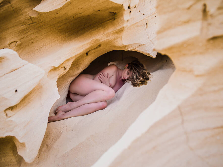 photographer StudioDee Banchory nude modelling photo. artemis taking a quick nap in a sand cave on fuerteventura        must admit made me a little nervous when she climbed in just in case anyone walked over the top.