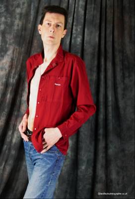 model RichardStandup glamour modelling photo taken at Brislinghurst taken by @DavidTaylor . male standing in open maroon shirt.