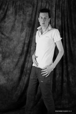 model RichardStandup lifestyle modelling photo taken at Brislinghurst taken by @DavidTaylor . mono male standing in white polo style shirt and walking trousers.